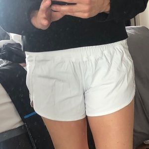 White Lululemon running shorts